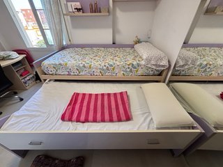 Cama nido blanca y lila con cajones