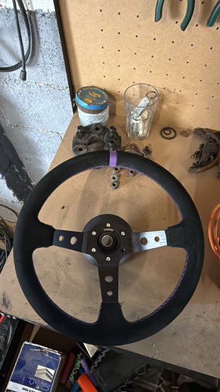 Volante desplazado + piña bmw e46