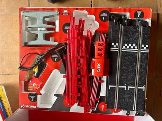 3 cajas Scalextric y curva deslizante hielo