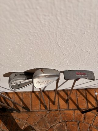 Palos de golf Wilson con bolsa Nike Golf