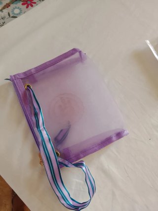 Pochette trasparente con zip e tracolla