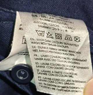 Jersey azul con cremallera cruzada
