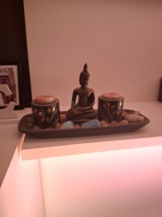 Figura Buda con portavelas