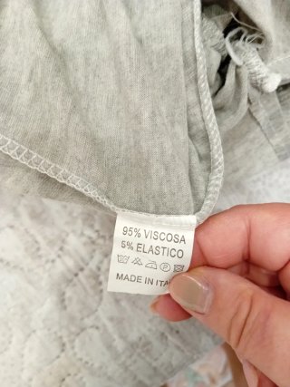 Tuta grigia con pantaloni