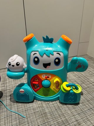 Juguete Fisher-Price Rocky Dinosaurio