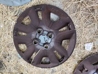 Tapacubos Dacia Spring 14 Originales