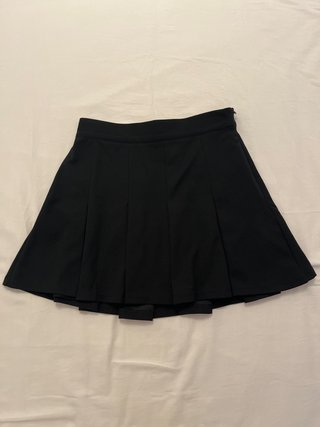 Mini falda plisada negra
