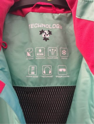 Chaqueta de esquí verde y rosa