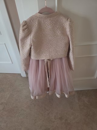 Conjunto de chaqueta y vestido niña.