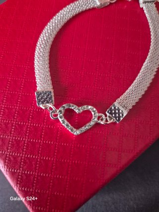 Pulseira coração com malha prateada