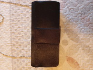 Bolso de fiesta negro con flor