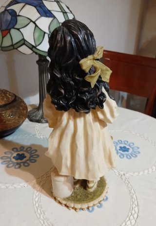 Grande bambola in resina con orsetti