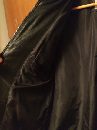 Chaqueta de piel marrón oscuro