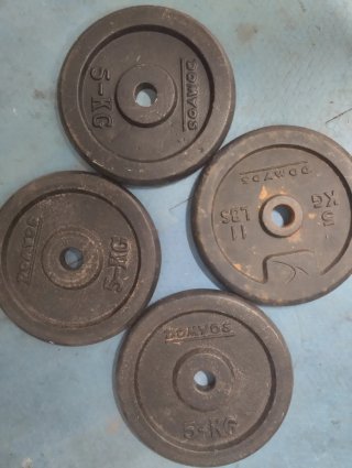 8 discos pesas 5 kg DOMYOS