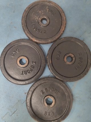 8 discos pesas 5 kg DOMYOS