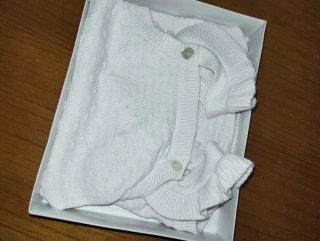 Peto bebé rosa claro tejido (52cm)