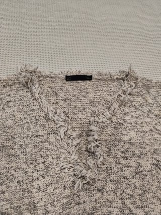 Chaleco de punto beige y gris