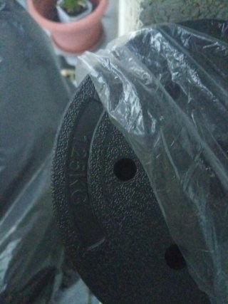 Juego de pesas y barras