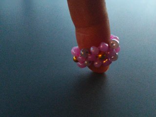 Anillo flores ajustable rosa y gris