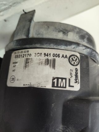 Faros Volkswagen Passat B6 de 2008.