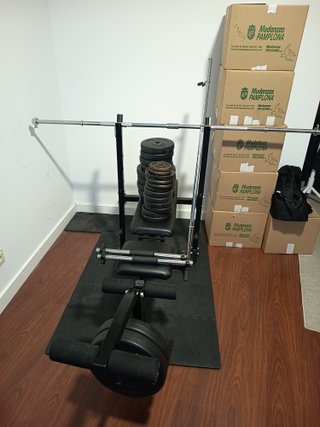 Banco de pesas 150cm con barra y discos