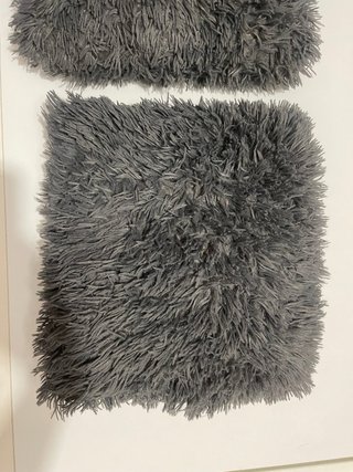 Cojín pelo gris suave