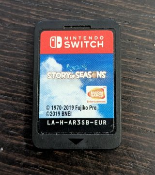 Nintendo Switch Lite Coral + Accesorios + Juegos