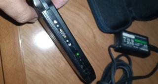 PSP 1004 + Caricabatterie + Custodia + Scheda