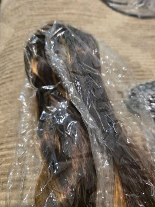 Extensiones de cabello ondulado con mechas