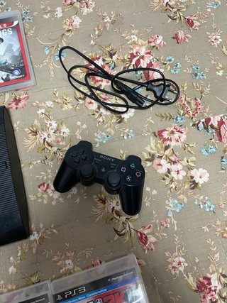 Playstation 3 + 2 mandos + 7 juegos