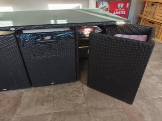 Mesa y sillas ratán cristal exterior