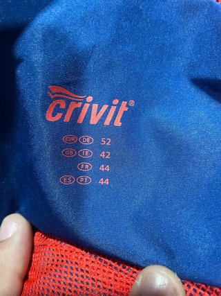 Chaqueta impermeable Crivit azul y roja