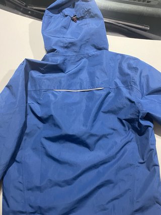Chaqueta impermeable Crivit azul y roja