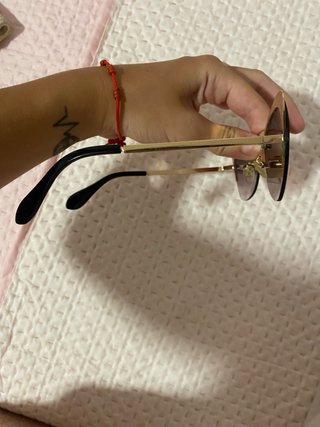 Gafas de sol marrones y doradas