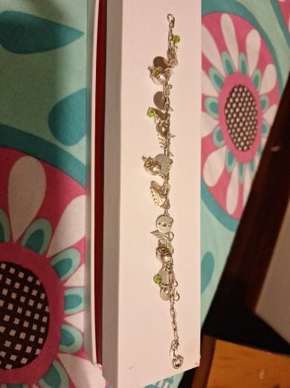 Pulsera de plata con charms