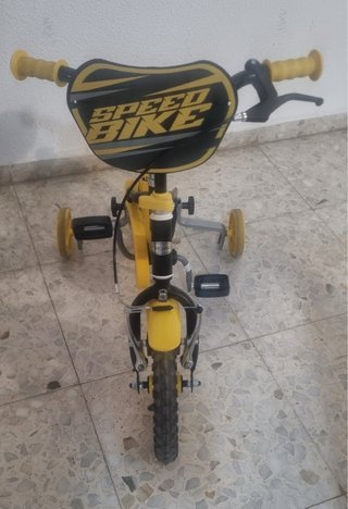 Bicicleta infantil amarilla y negra