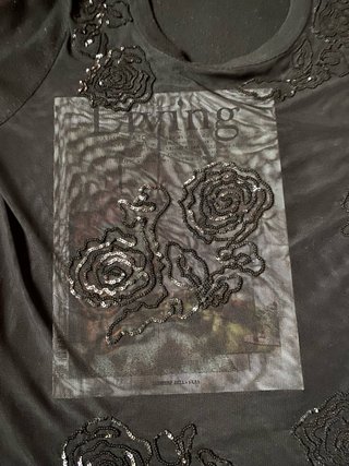 Sotto giacca nero trasparente con fiori ricamati