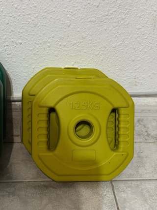 Barra de pesas con discos