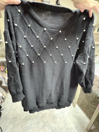 Jersey negro con perlas