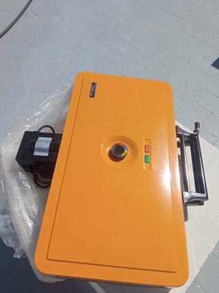 Plancha de prensa naranja