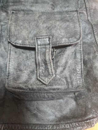 Mochila de cuero negra y gris
