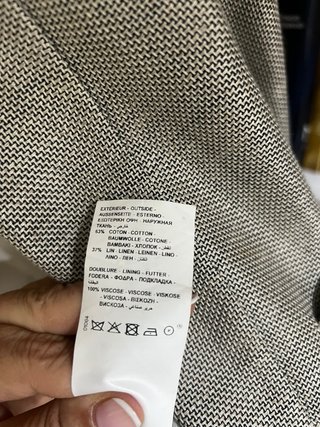 Americana de lino gris con coderas