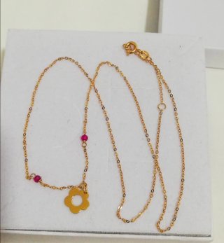 Collar oro 18k flor y rubíes