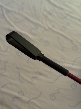 Casco rosa y palo hípica