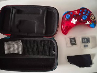 Nintendo Switch + 5 Juegos + Mando+Porta nintendo