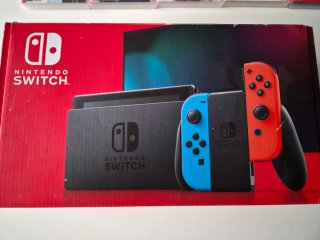 Nintendo Switch + 5 Juegos + Mando+Porta nintendo