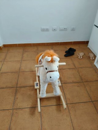 Caballo balancín infantil