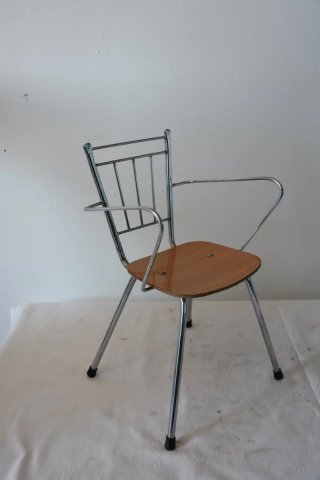 Antigua silla vintage infantil cromada