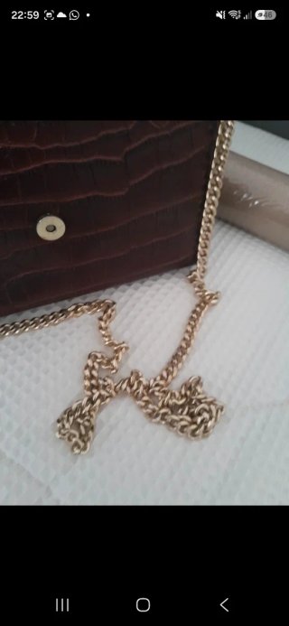 Bolso fiesta Zara Basic marrón y dorado