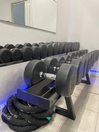 Banco de pesas y jaula de potencia